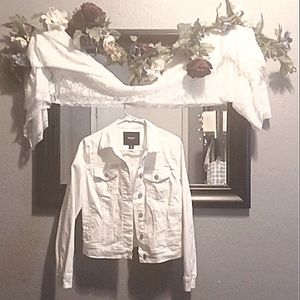 A jean jacket by Nine West